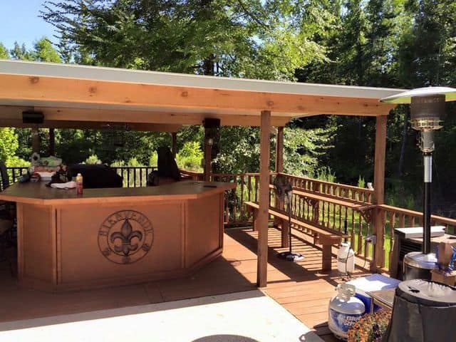 Covered outdoor kitchen and bar
