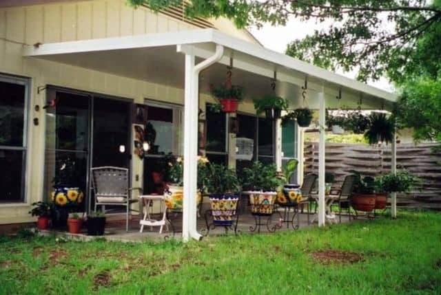 Covered porch with hanging plants