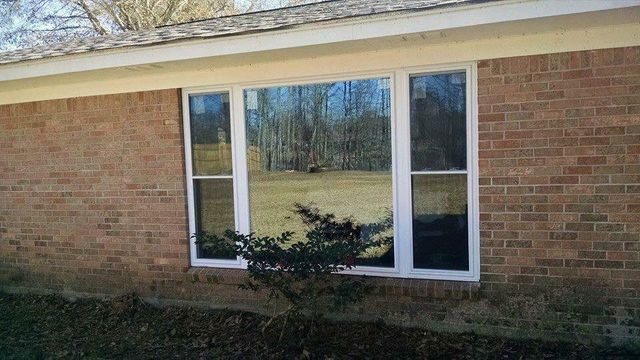 Picture window on a brick home