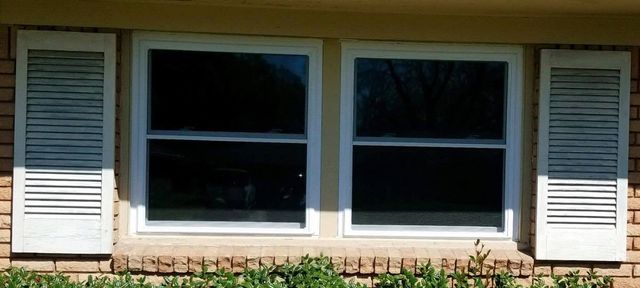 Twin windows with shutters
