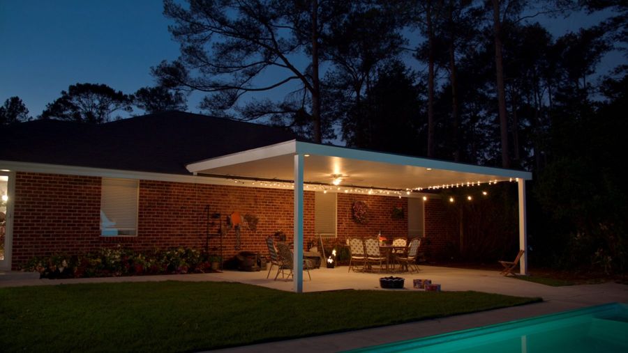 Patio cover with string lights at dusk